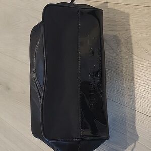 Burberry toiletry bag with signature black plaid interior